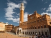 Tower of Town hall in Siena with part of square